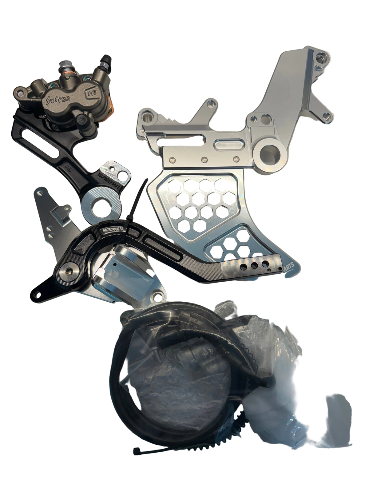 Surron Ultra Bee footbrake components showing OEM caliper, rotor guard, mounting bracket and hose