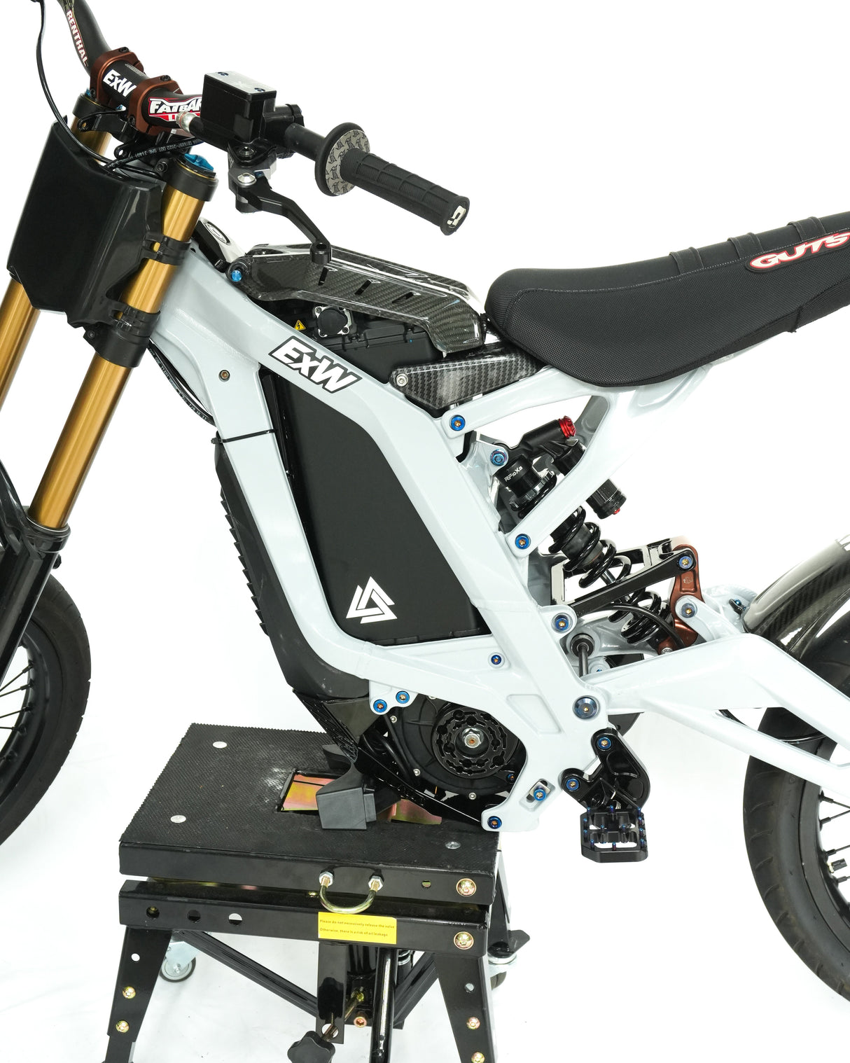 Matte black battery wrap installed on e-bike, factory-clean blacked-out look, installed on a surron LBX