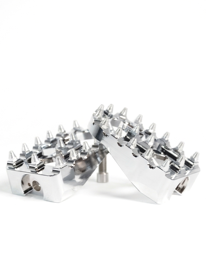 E-bike passenger pegs with aggressive grip, moto-inspired design, chrome pegs
