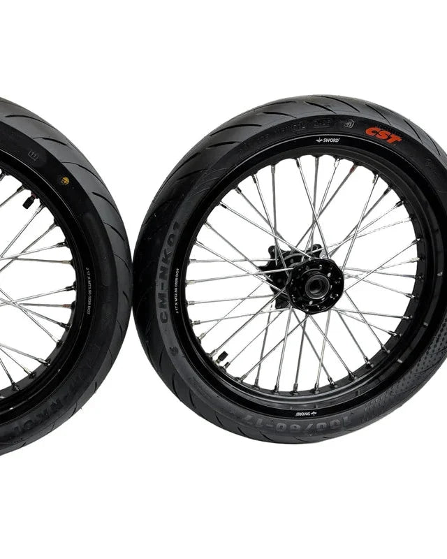 Black Surron Ultra Bee 17 x 2.50-inch front supermoto wheel and CST tire