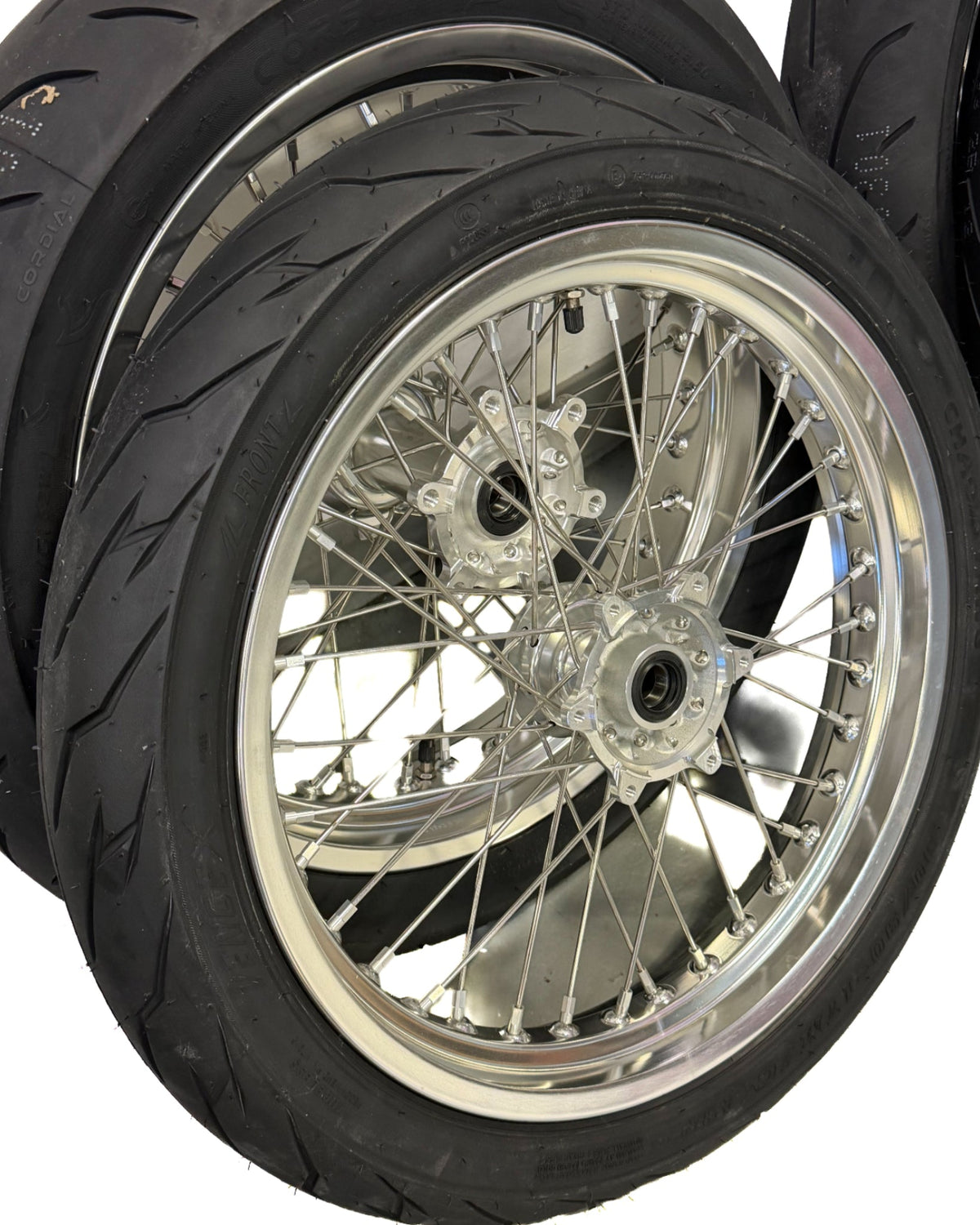 Silver Talaria Komodo 17-inch supermoto wheels with street tires