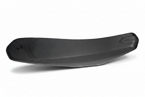 Surron Ultra Bee low-cut seat showing contoured shape and textured cover