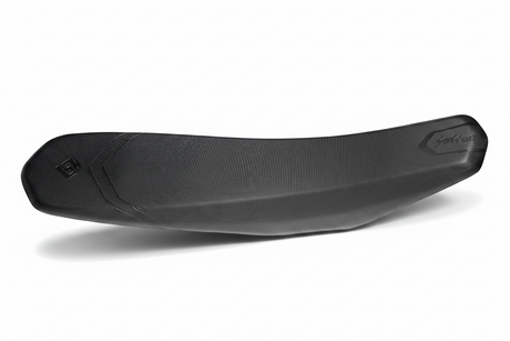 Surron Ultra Bee low-cut seat showing contoured shape and textured cover