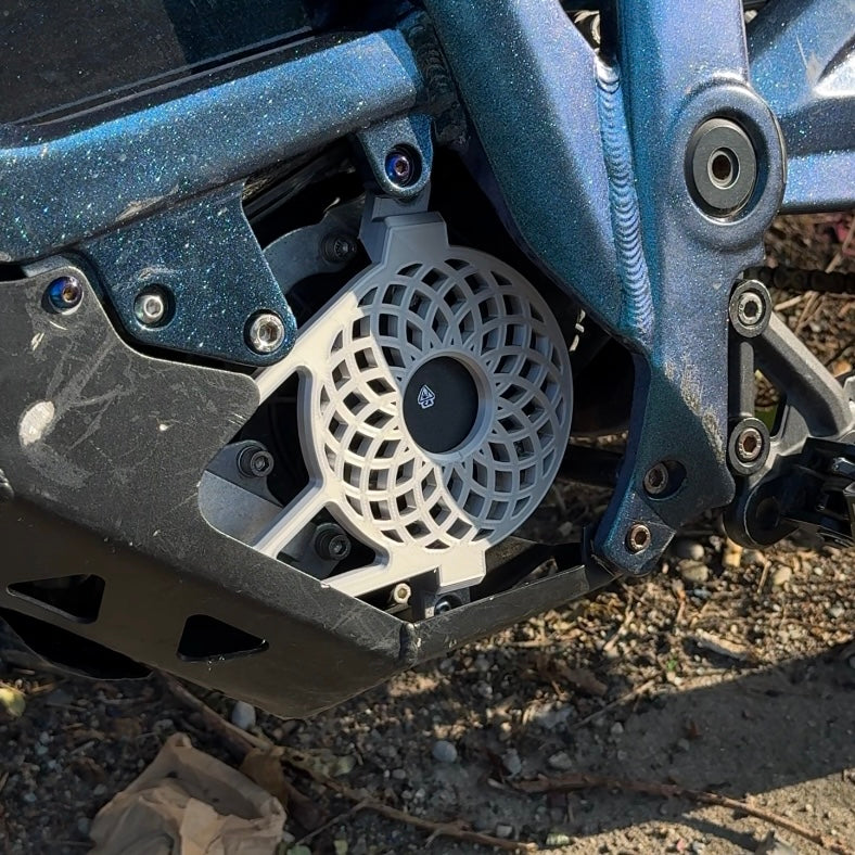 Talaria sting chrome gearbox cover installed on bike