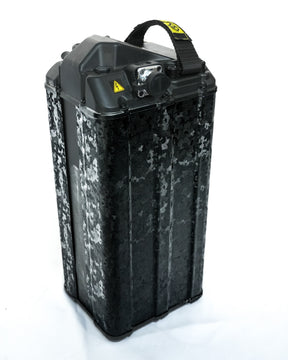 Forged carbon black camo battery wrap on Surron e-moto, machine-cut vinyl