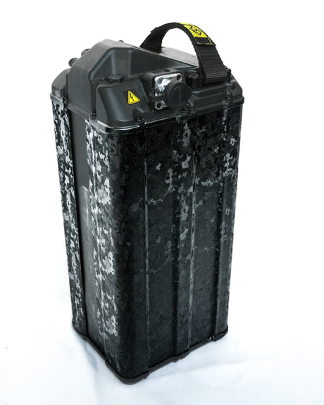 Forged carbon black camo battery wrap on Surron e-moto, machine-cut vinyl