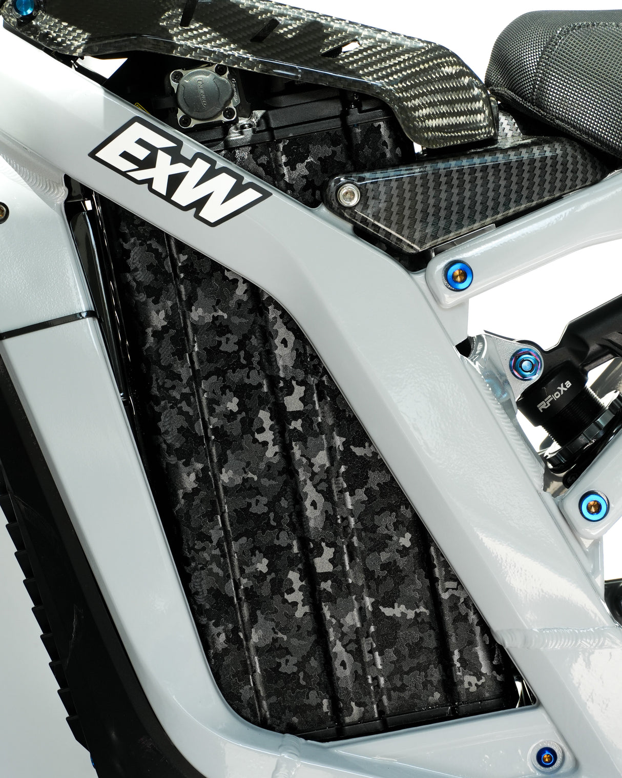 	Black Forged carbon battery wrap installed on e-bike, reflective camo finish