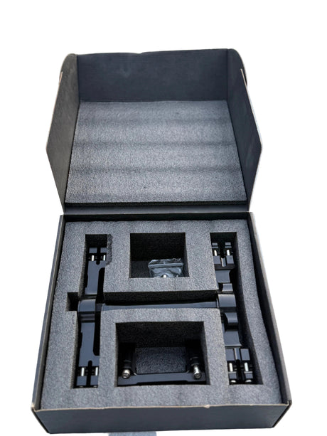 Surron Ultra Bee triple clamps and mounting components in protective packaging
