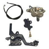 Talaria footbrake components showing CNC mounting plate and adjustable pedal tip