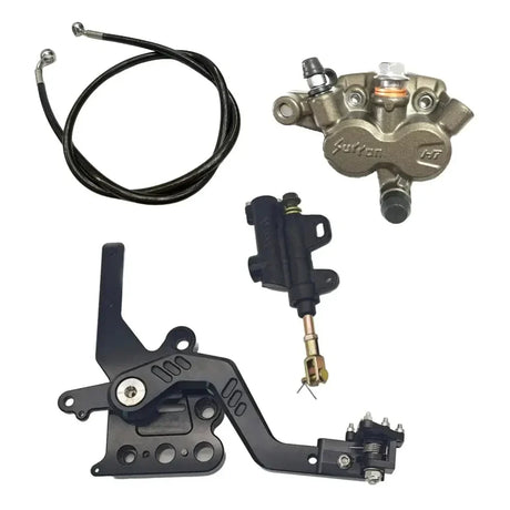 Talaria footbrake components showing CNC mounting plate and adjustable pedal tip