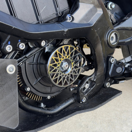 Surron ultra bee chrome metal motor cover installed on the bike metal belt cover