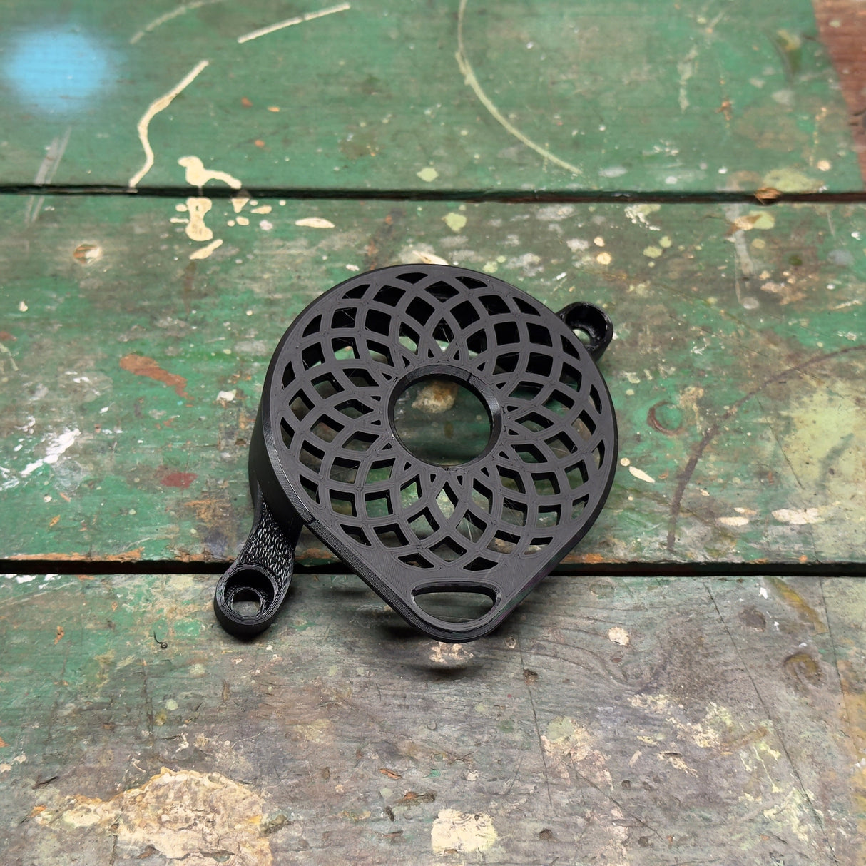 	Atom style Sur-Ron motor cover in black, impact-resistant plastic