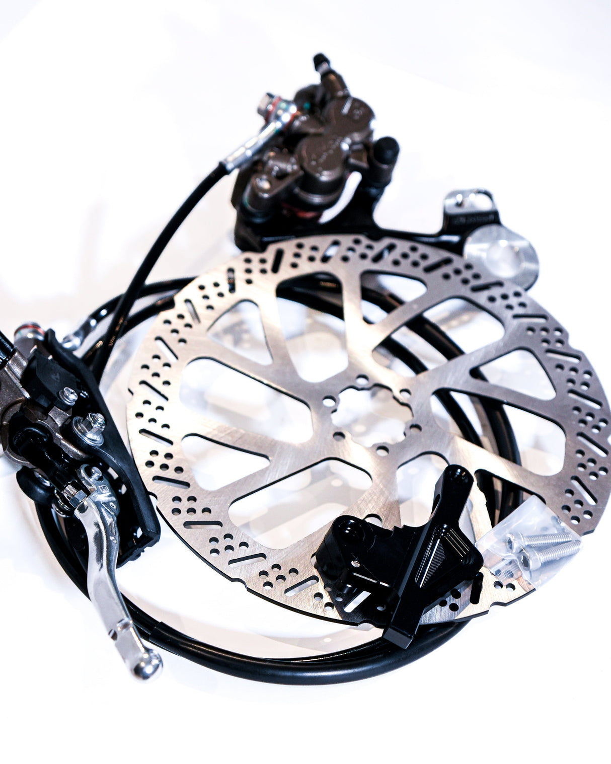 OEM Ultra Bee rear brake caliper close-up, pre-bled hydraulic system