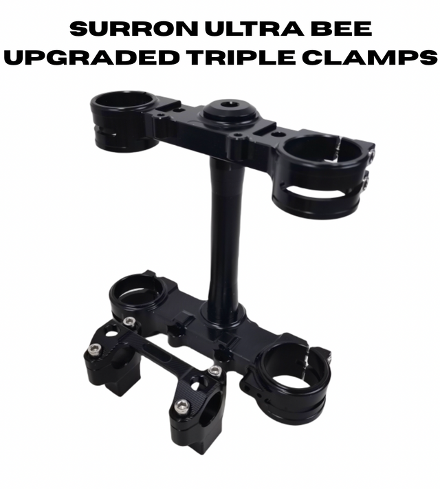 Surron Ultra Bee triple clamp assembly showing steering stem and handlebar mount