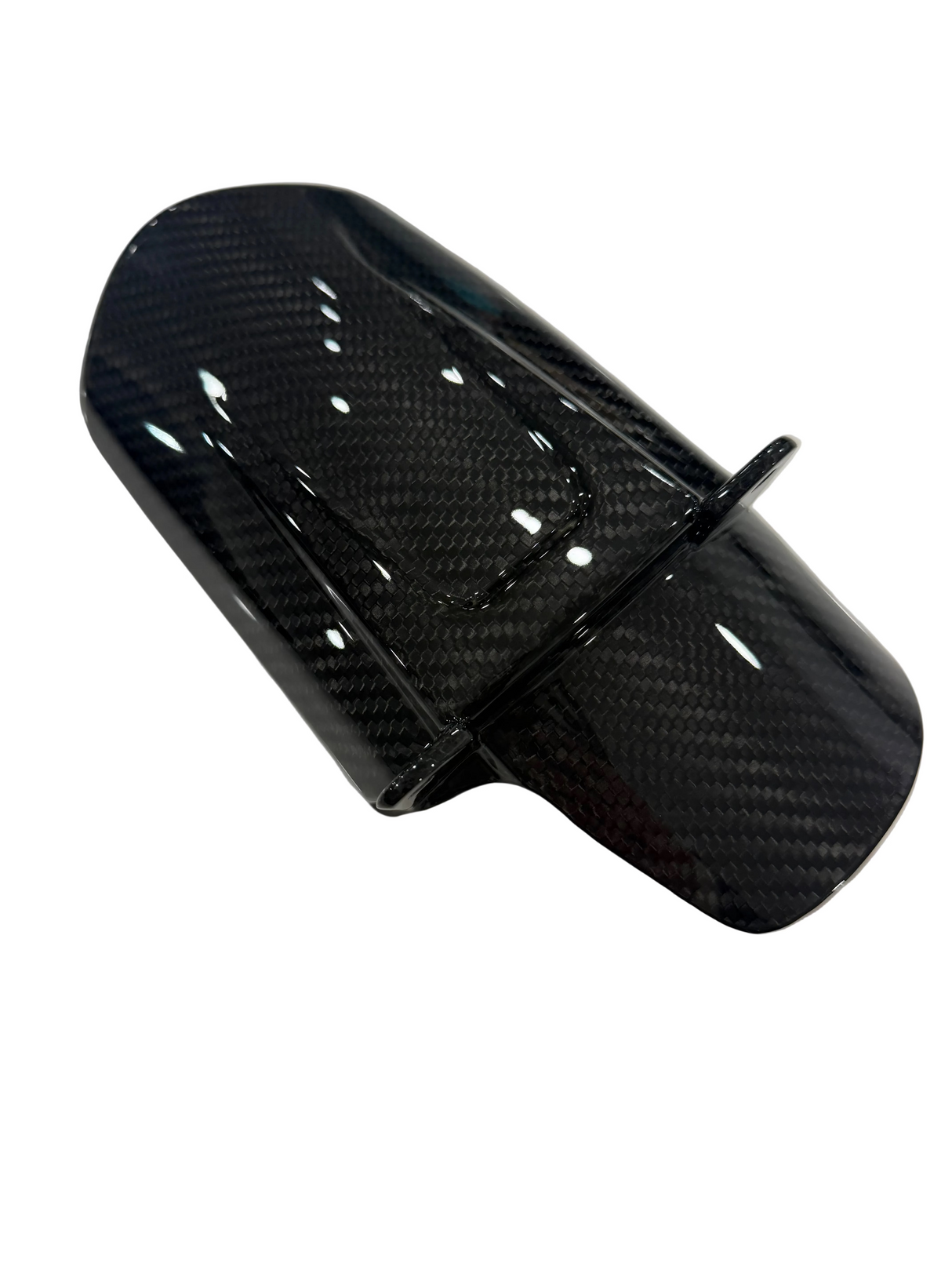 Side view of carbon fiber mud guard for surron lbx, glossy carbon weave finish