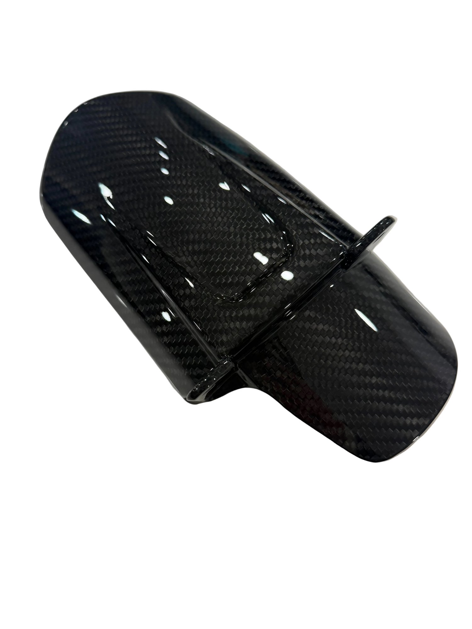 Side view of carbon fiber mud guard for surron lbx, glossy carbon weave finish