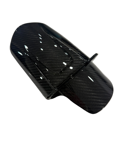 Side view of carbon fiber mud guard for surron lbx, glossy carbon weave finish