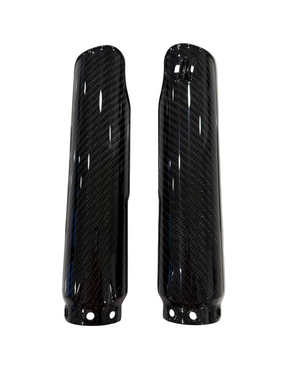A pair of glossy black carbon fiber fork guards with a visible woven carbon pattern, shown against a plain white background.