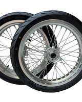 Silver Surron Ultra Bee 17-inch supermoto wheels with CST street tires