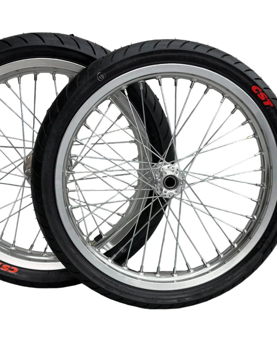 Silver Surron and E-Ride Pro 17-inch supermoto wheels with street tires