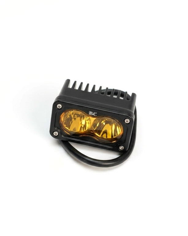 	Battery-powered yellow Baja light with handlebar switch